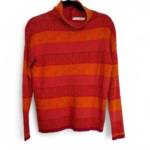 Danish brand Mansted vibrant striped turtleneck sweater